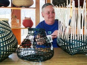Billie Ruth Sudduth weaves baskets in her studio